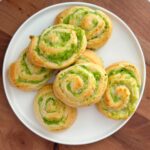 Pea and cream cheese pinwheels on a plate