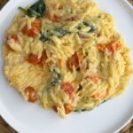 Easy feta orzo bake on a white plate
