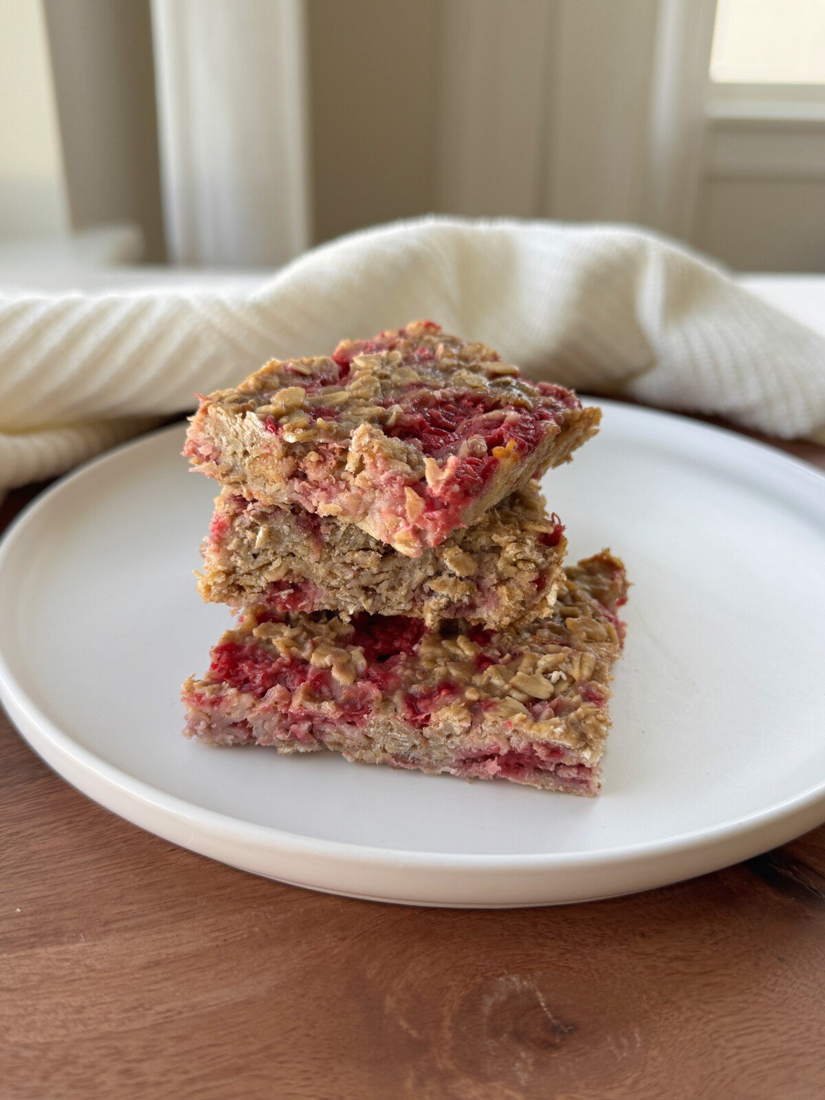 A stack of three easy raspberry oat bars