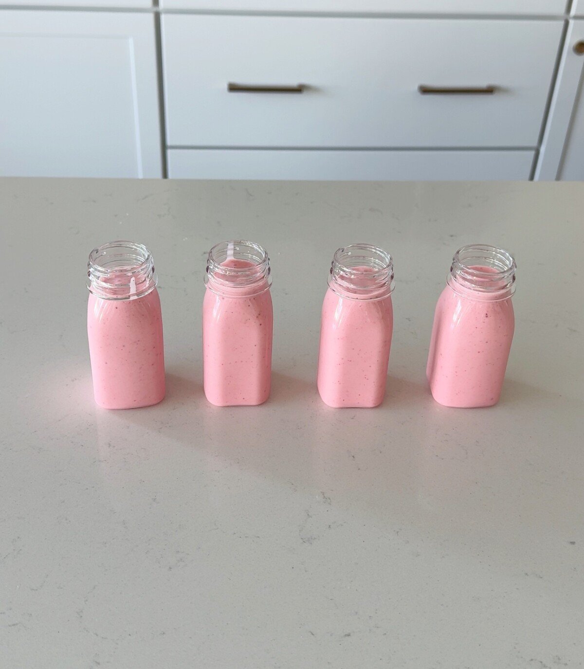 Easy drinkable strawberry yogurt in four cups